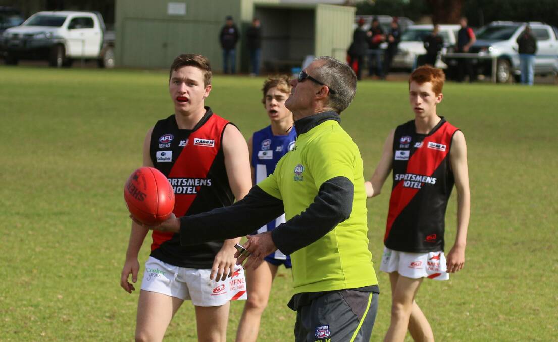 Shane Lenon umpiring an under 17 game in recent seasons. Picture by Cathie Fox