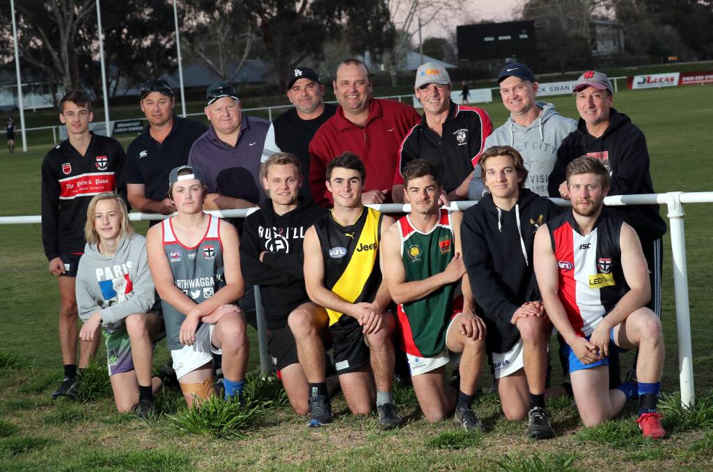 Garry Crouch (back row, second from right) with his son Isaac (front row, second from right) alongside all of North Wagga's father and sons heading into the 2018 grand final. Picture by Les Smith