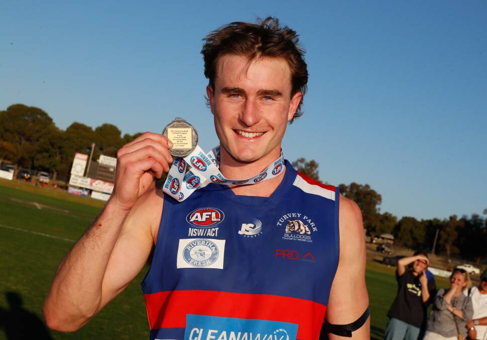 Luke Fellows shows off his best-on-ground medal in Turvey Park's premiership win last month. Picture by Les Smith