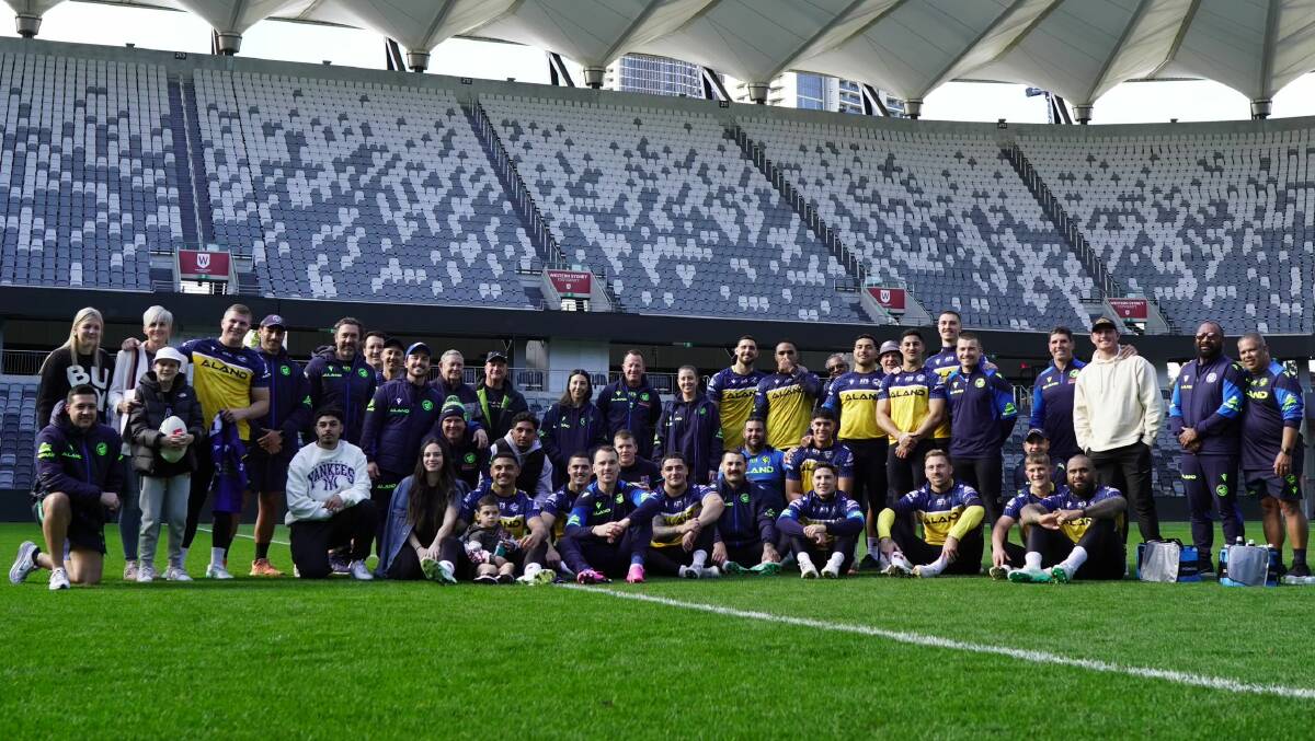 The Guymer family with Parramatta's playing group at CommBank Stadium on Wednesday. Picture supplied