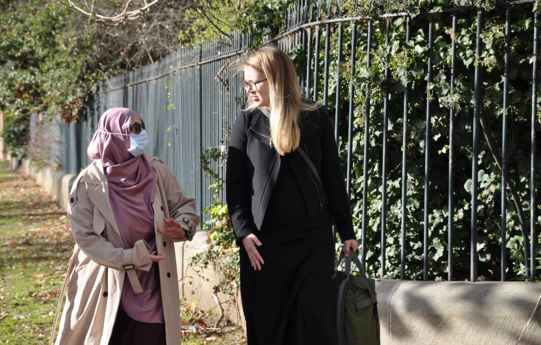 Mariam Raad (left) arrives at Goulburn Local Court with a a member of her legal team. Picture by Louise Thrower.