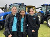 Maddy Egan, Adele Tropeano and Molly Currey at the Riverina Field Days on Friday. The weather forced organisers to abandon the event on Saturday. Picture by Cai Holroyd