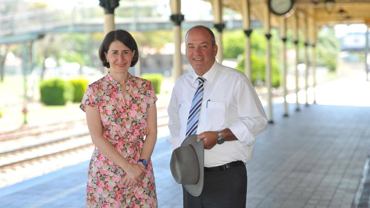 Then-NSW transport minister Gladys Berejiklian and then-Wagga MP Daryl Maguire at Wagga railway station in 2015. Picture: Les Smith