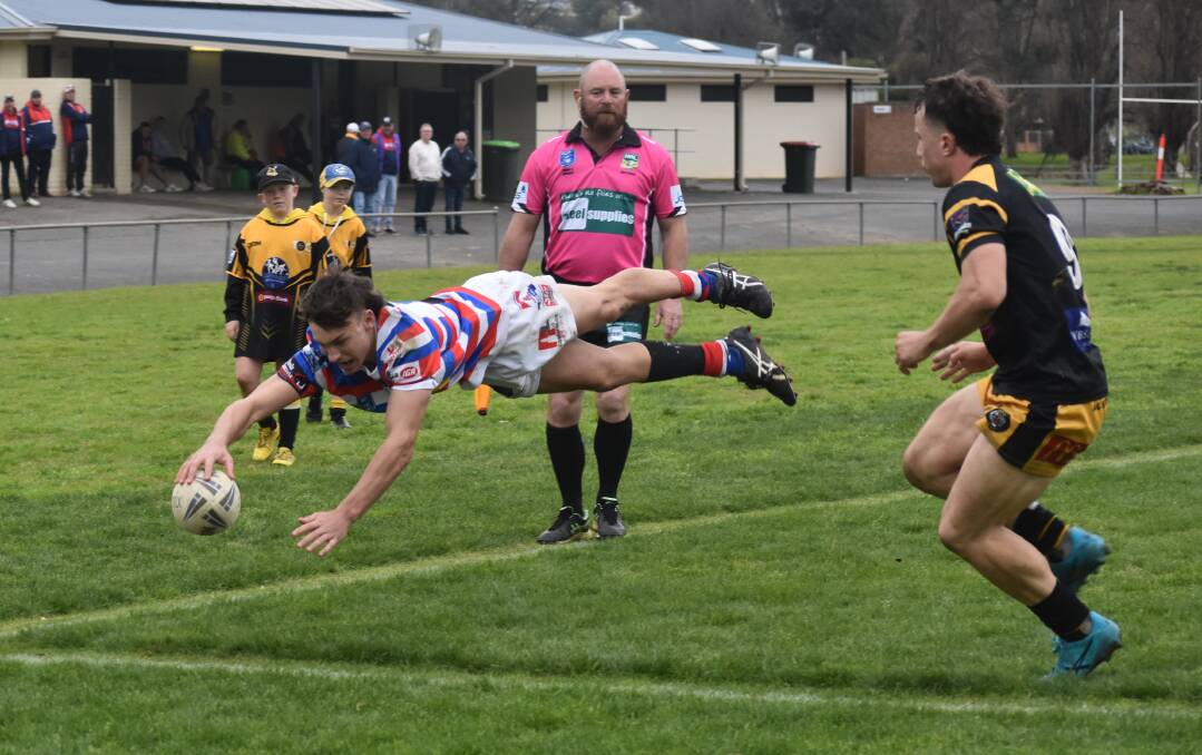Sam Graziani dives over for what would have been his fourth try, only to be denied by a forward pass call. Picture by Courtney Rees