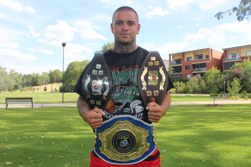 Dan Jeffries with the spoils of his success in the Regional Riverina Light Middleweight division in the Brawl on the Bidgee in February. File picture by Jimmy Meiklejohn