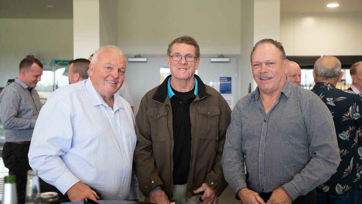 Les Boyd, Gary Davis and Cliff Lyons catch up at Group Nine's centenary luncheon at The Range Function Centre on Friday. Picture by Madeline Begley