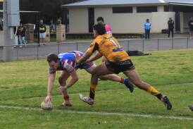 James Morgan can't stop Jack Bush from scoring his second try in Young's win over Gundagai at Anzac Park on Sunday. Picture by Courtney Rees