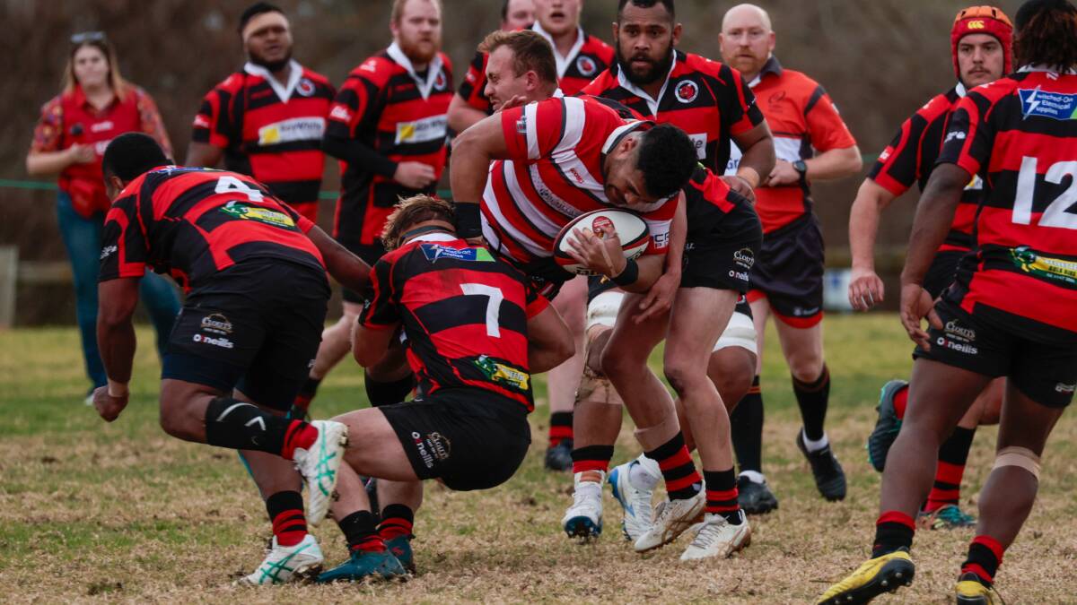 Fetongi Tuinauvai tries to break out of the Tumut defence during Reddies' crucial win at Beres Ellwood Oval on Saturday. Picture by Bernard Humphreys