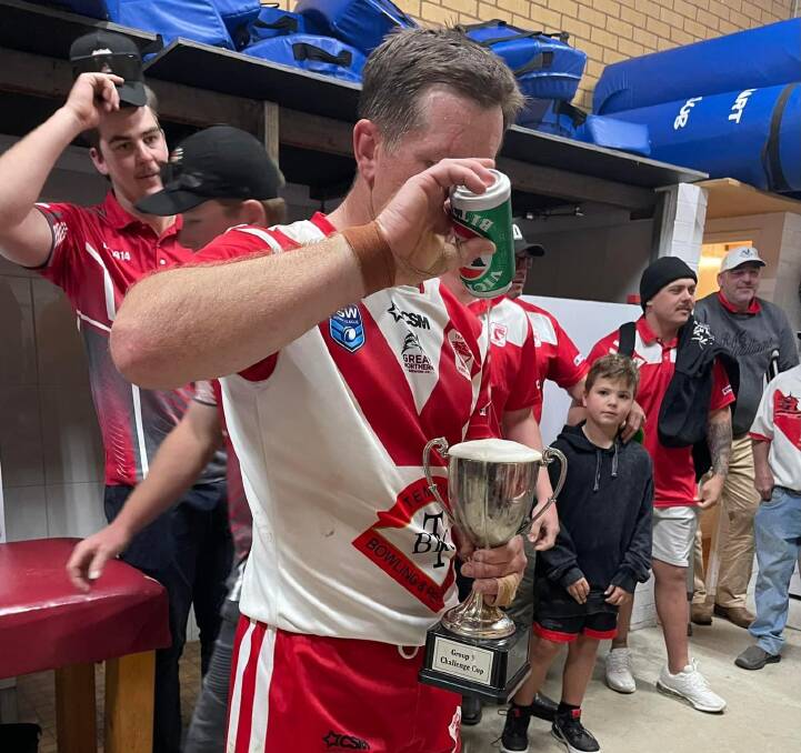 Temora captain-coach Josh McCrone celebrates their Challenge Cup success on Saturday.