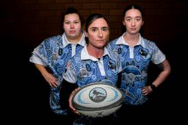 Wagga City players Jess Burgess, Kellie Allcorn and Tori Uhr in the special jumpers designed for multicultural round. Picture by Bernard Humphreys