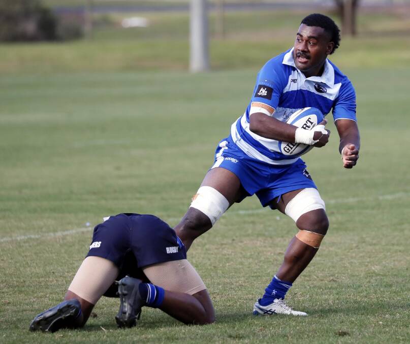 Tomasi Nabuliwaqa tries to break out for a tackle for Wagga City on Saturday.