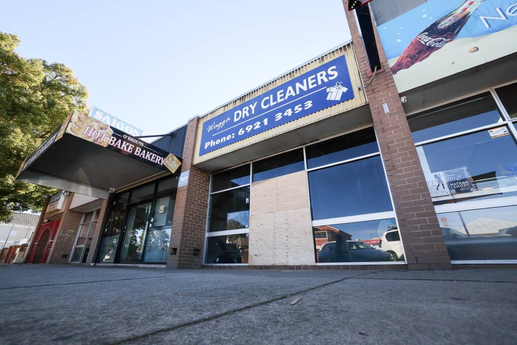 Despite their best efforts firefighters were not able to save Wagga Dry Cleaners after it went up in flames on Wednesday. Picture by Les Smith