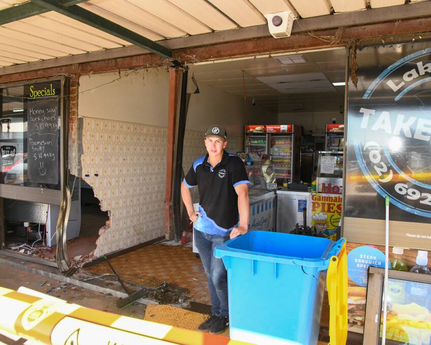 Lake Village Takeaway operator Shane Roberts is grateful no one was hurt when a car smashed through the front of his shop on Monday morning. Picture by Bernard Humphreys 