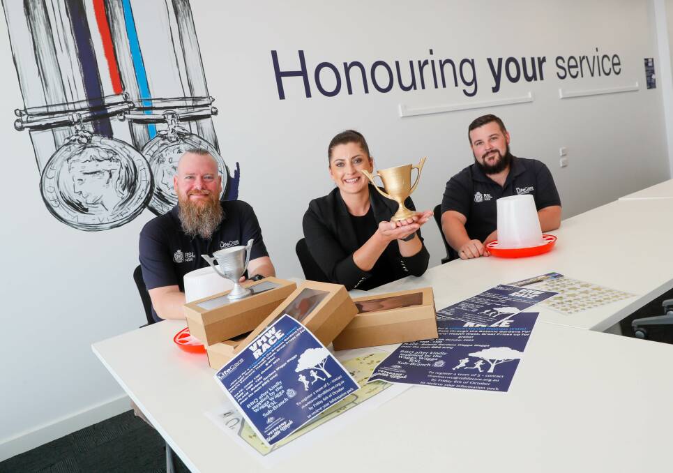 Riverina Wellbeing Centre navigator Stuart Voss, manager Charlotte Webb and veterans support co-ordinator Brian Robinson are preparing some fun activites for the Veterans Health Week. Picture by Les Smith