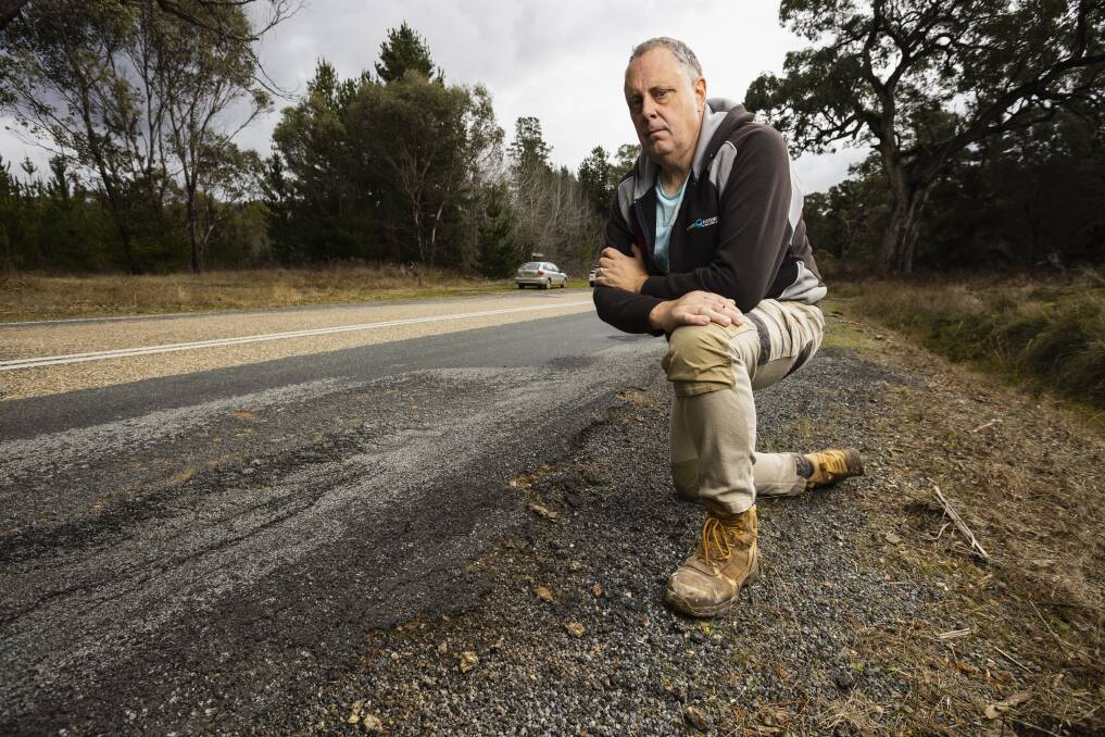 Tumbarumba resident Chris Rosvall is disgusted with the condition of Tumbarumba Road between the Hume Highway and the Murraguldrie bridge. Picture by Ash Smith 