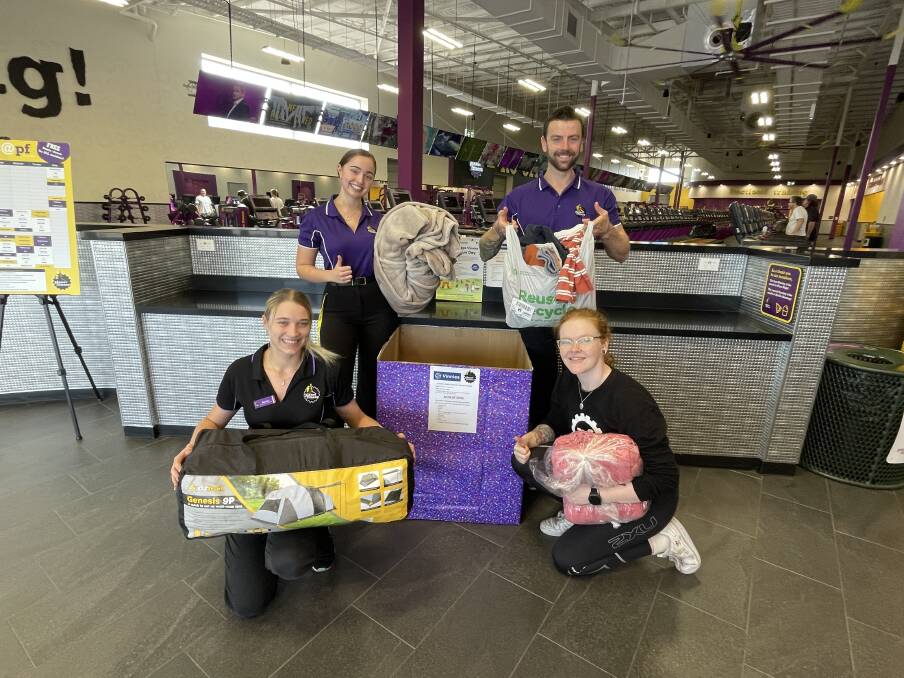 Planet Fitness Wagga assistant manager Reanna Skinner with Jasmine Thomson, Benji West and Olivia Plane at the donation collection point at the front of the gym. Picture by Taylor Dodge