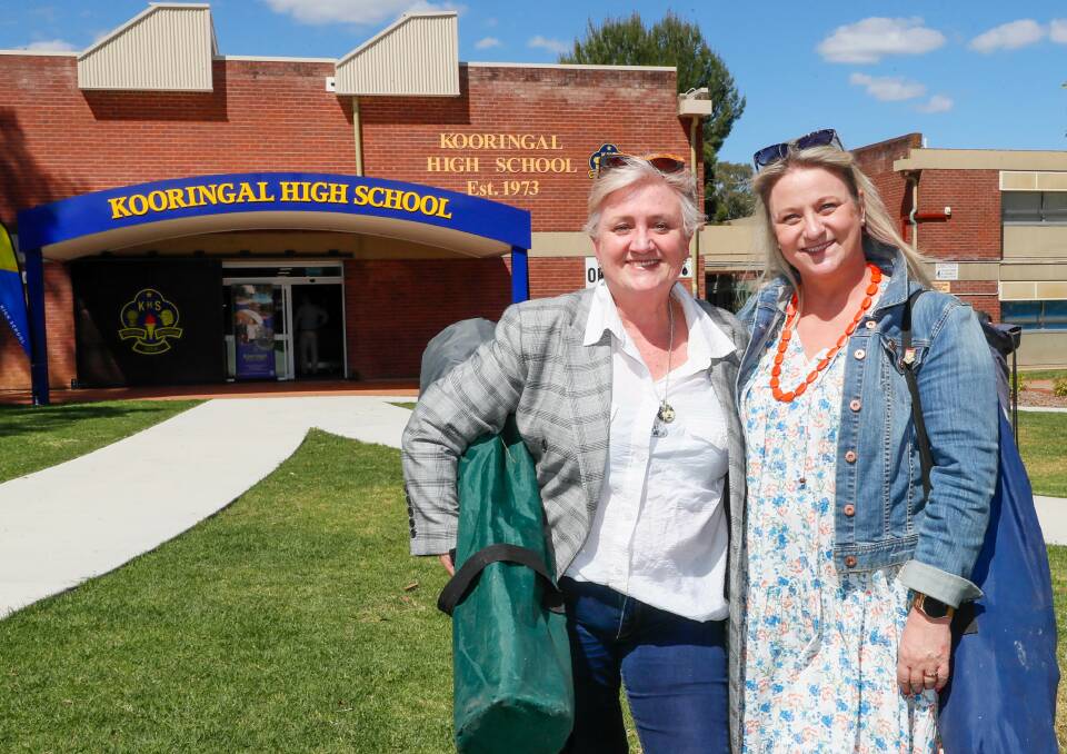 Nostalgia is what sisters Jo Buchanan from Lilyfield, Sydney and Kristy Cochrane from Downside felt when the former students returned to Kooringal High School on Saturday for its 50-year open day. Picture by Les Smith 