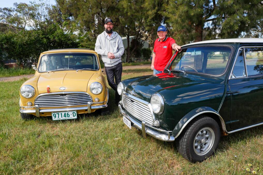 Riverina Mini Car Club vice president John Gray with his 1967 Morris Cooper S and president Phil Bell with his 1967 Morris ahead of the 20th show and shine. Picture by Les Smith 