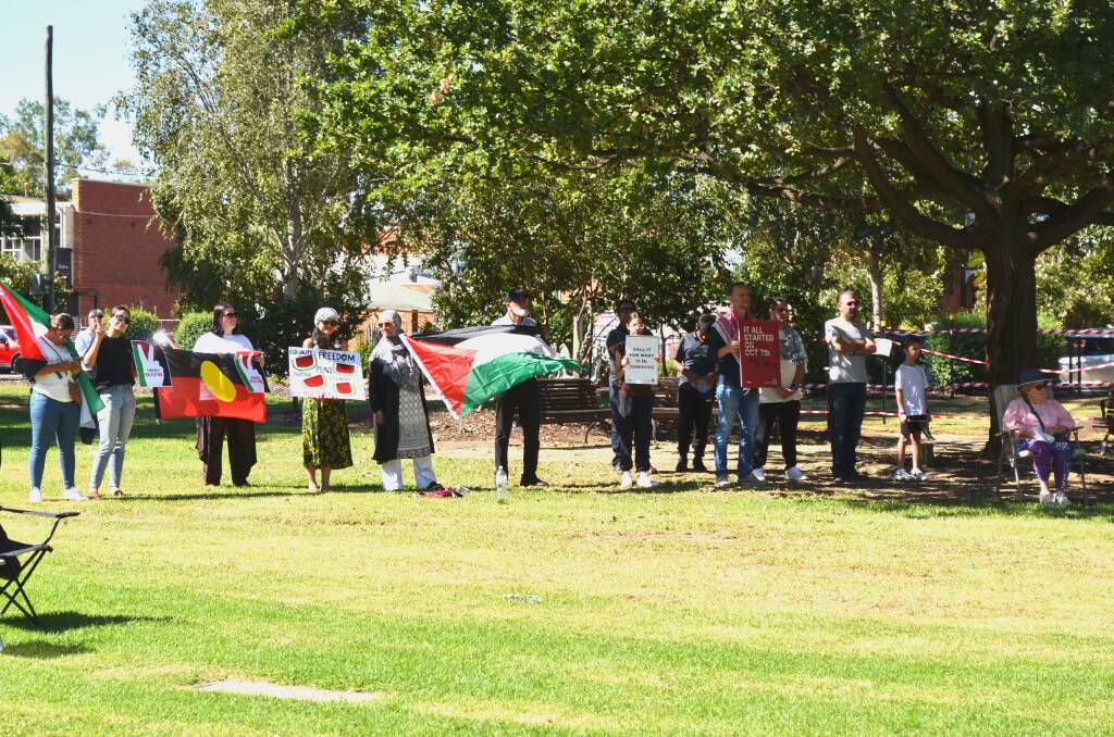 Federal Member for Wagga Michael McCormack addresses the Peace for Gaza protestors at the Combined Rotary Clubs of Wagga Peace Day Ceremony on Sunday after months of butting heads. Picture by Taylor Dodge