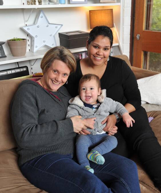 Sarah Williams (right) with partner Lisa Saffrey and their son, Yarrul.