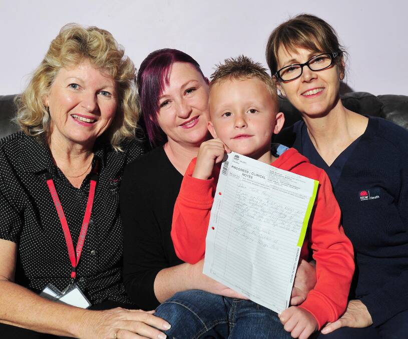 GOOD TIMES: Tracey Seach and Liam Lang, 5, (centre) thank Jennifer Lang and Angela Trevaskis for their support before and after Liam's operation. Picture: Kieren L Tilly