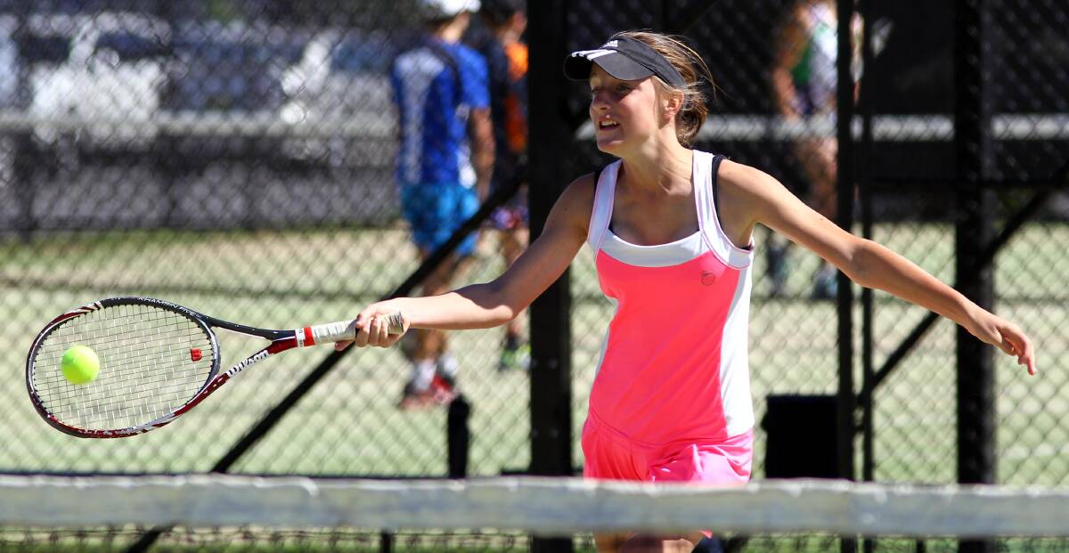 IN CONTROL: Sophie Toole, 13, working up a sweat at the junior tennis competition at Jim Elphick tennis centre. Picture: Les Smith