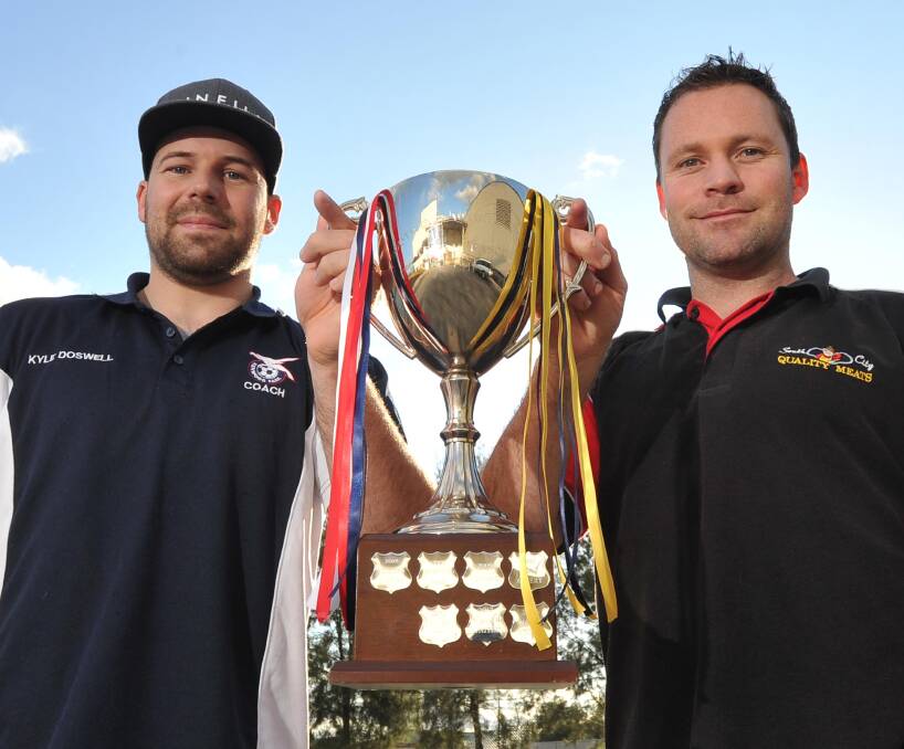 EQUAL SHOT: Henwood Park coach Kyle Doswell and Junee player Jason Mutimer gunning for the Pascoe Cup at Equex on Sunday night. Junee finished as minor premiers and have not won the cup since 1975. Picture: Laura Hardwick