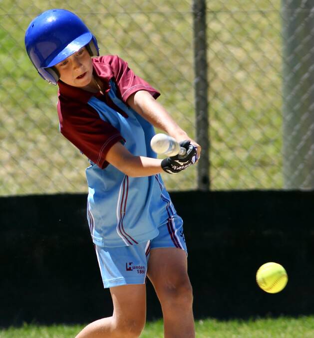 READY TO RUN: Lake Albert Stingrays player Jacob Rose clearing the ball and on route to first base. Picture: Les Smith