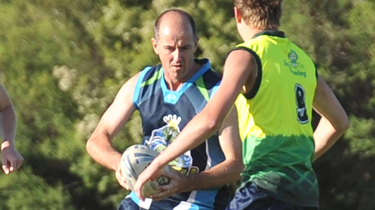 IN ACTION: Touch football coach Kelvin Salmon plays for the Bidgee Irrigators in 2011. Salmon will coach his wife's team, the women's defending premiers, this season.