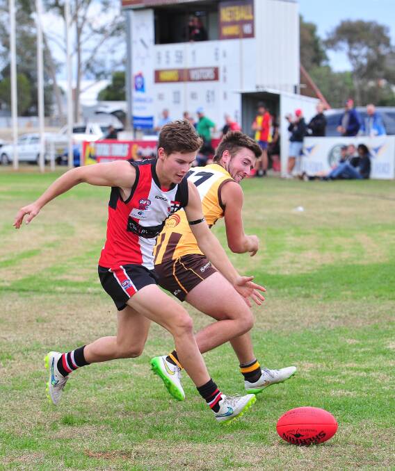 INJURED: North Wagga forward flanker Josh Thompson sits out this week due to a shoulder injury as the Saints play Marrar. Here he beats East Wagga-Kooringal player Dean Jones to the ball. Picture: Kieren L. Tilly