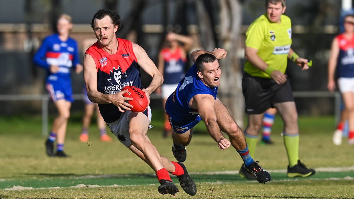 Abe Wooden in action for the Demons.