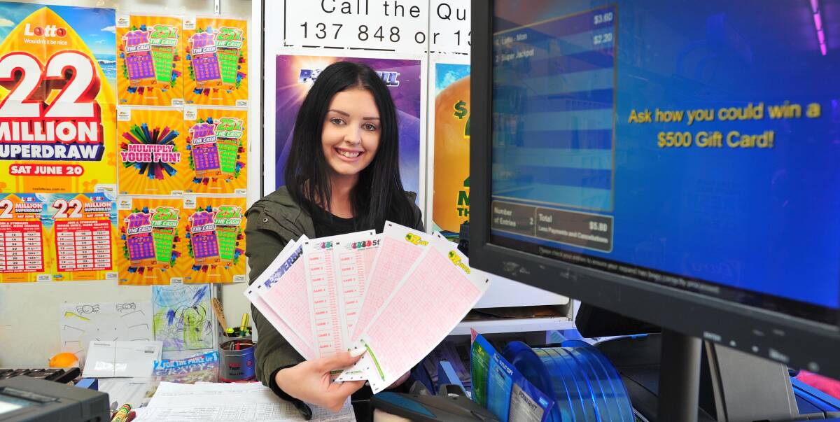 LUCK OF THE DRAW: Marney Peacock, of Lake Albert Newsagency, is on the lottery counter ahead of the $22 million Lotto draw. Picture: Kieren L Tilly