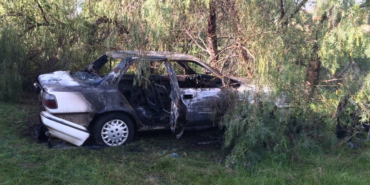 A stolen white Toyota Corolla was burnt out in a nature reserve in Tolland on Tuesday night.
