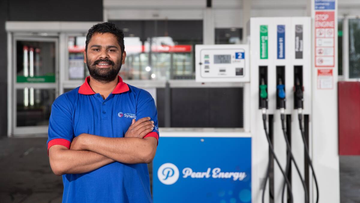 Pearl Energy console operator Thyaghu Babu expects more motorists to fuel up at the Forsyth Street petrol station once they find out it has re-opened. Picture by Madeline Begley