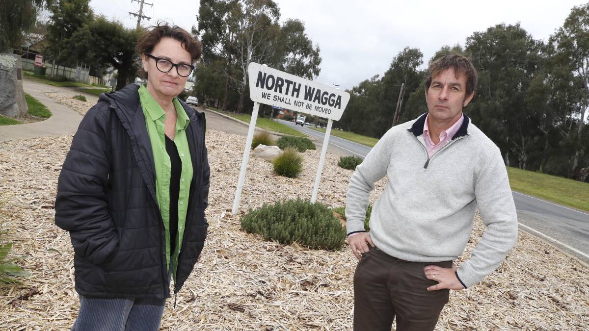 North Wagga Residents Association members Fiona Ziff and Michael Friend believe their suburb should receive more substantial flood protection than the one-in-20-year levee being considered by Wagga City Council. Picture by Les Smith