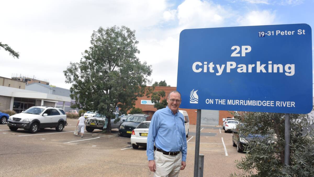 CARPARK JOY: David Payne says reopening of a carpark at the back of South Town Walk is the best Christmas present retailers in the arcade could receive. Picture: Ken Grimson