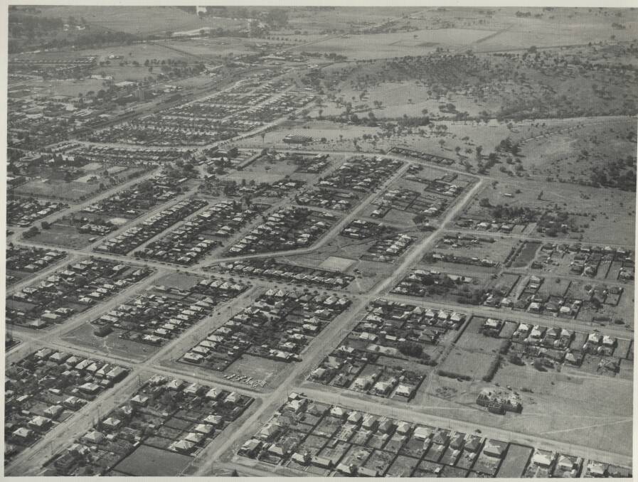 An aerial photo of Turvey Park in the 1950s, with the railway line in the top left corner and Turvey Park school under construction in the bottom right. Picture supplied