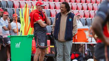 Wayne Bennett (left) and All Blacks great Tana Umaga have compared notes at Dolphins training. Photo: HANDOUT/DOLPHINS MEDIA