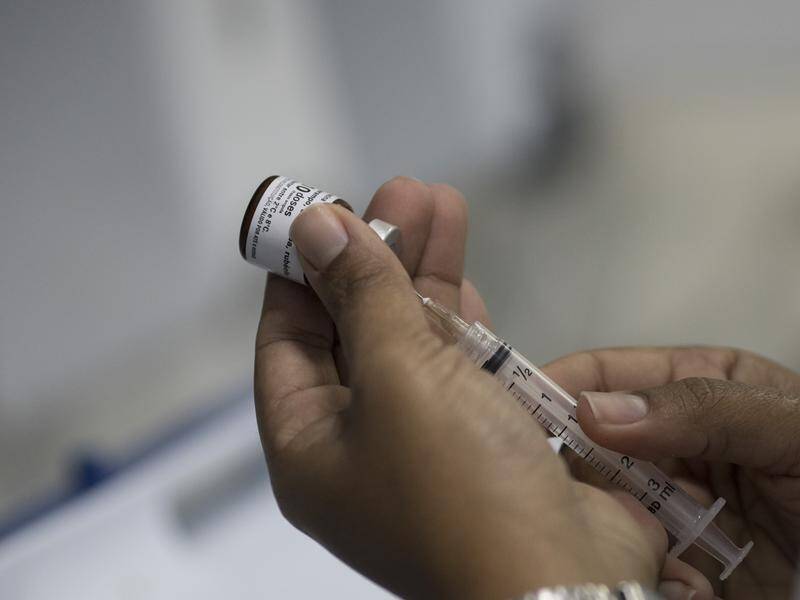 Experts are urging people who may be susceptible to measles to get vaccinated. (AP PHOTO)