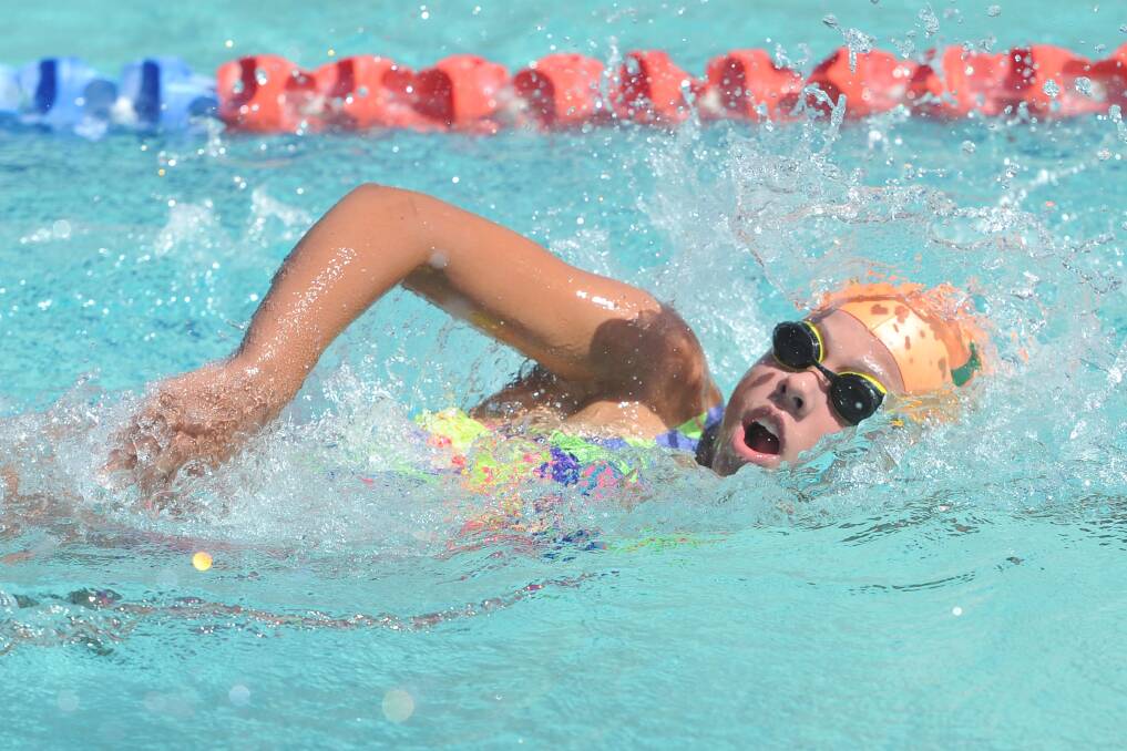 TURNING THE TIDES: Ruby Alchin glides through the water at the Oasis Regional Aquatic Centre. Picture: Laura Hardwick