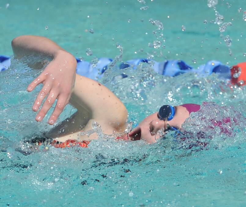 FIGHTING ON: Sara Negus pushes forward at the BISSA swimming carnival recently. Picture: Laura Hardwick