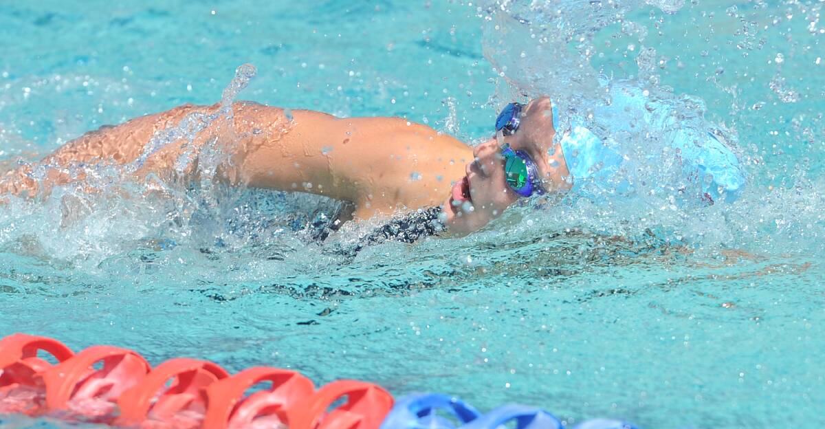IN THE SWIM: Olivia Hearn lifts the tempo during a freestyle event at the Oasis Regional Aquatic Centre. Picture: Laura Hardwick