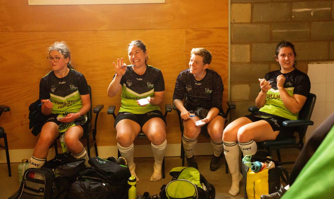 Elizabeth Evers, Kara Dyason, Jessica Fordree and Caitlin Lewis are entertained while recording their votes for best on ground in the sheds after South Waggas Madden Shield game against Leeton United at MIA Sports Field. Picture by Madeline Begley