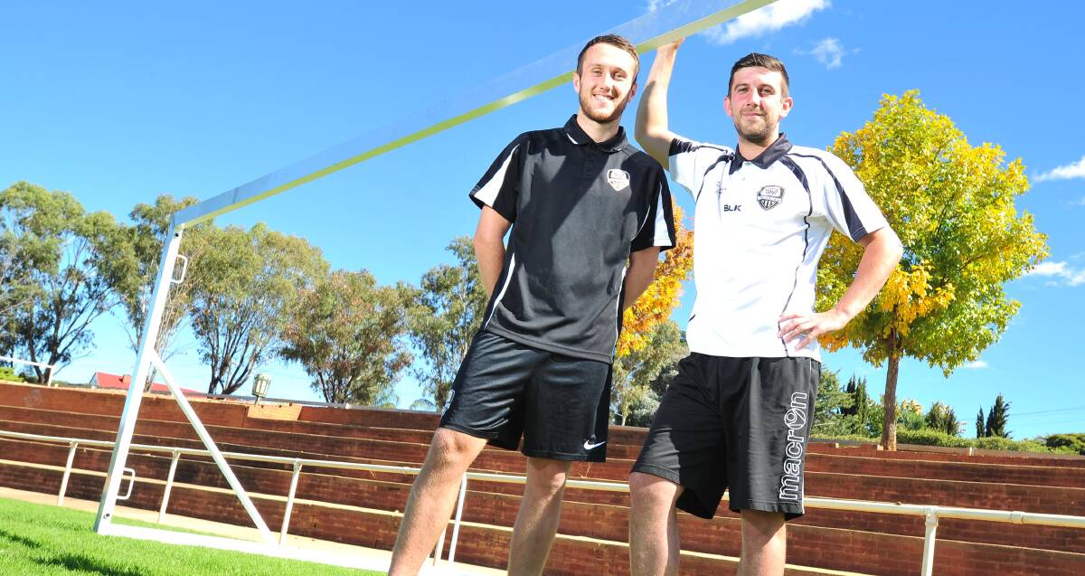 GIANT STEP: Two of Wagga City Wanderers new Scottish players Jonny Mathers and Ally Macleod ahead of the club's first State League 2 game at Gissing Oval on Saturday.