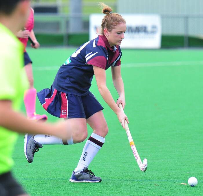 ON THE ATTACK: CSU Maroon's Karyn Jennings brings the ball forward in her team's 6-0 loss to CSU Navy in division one play at Jubilee on Sunday. Picture: Kieren L Tilly