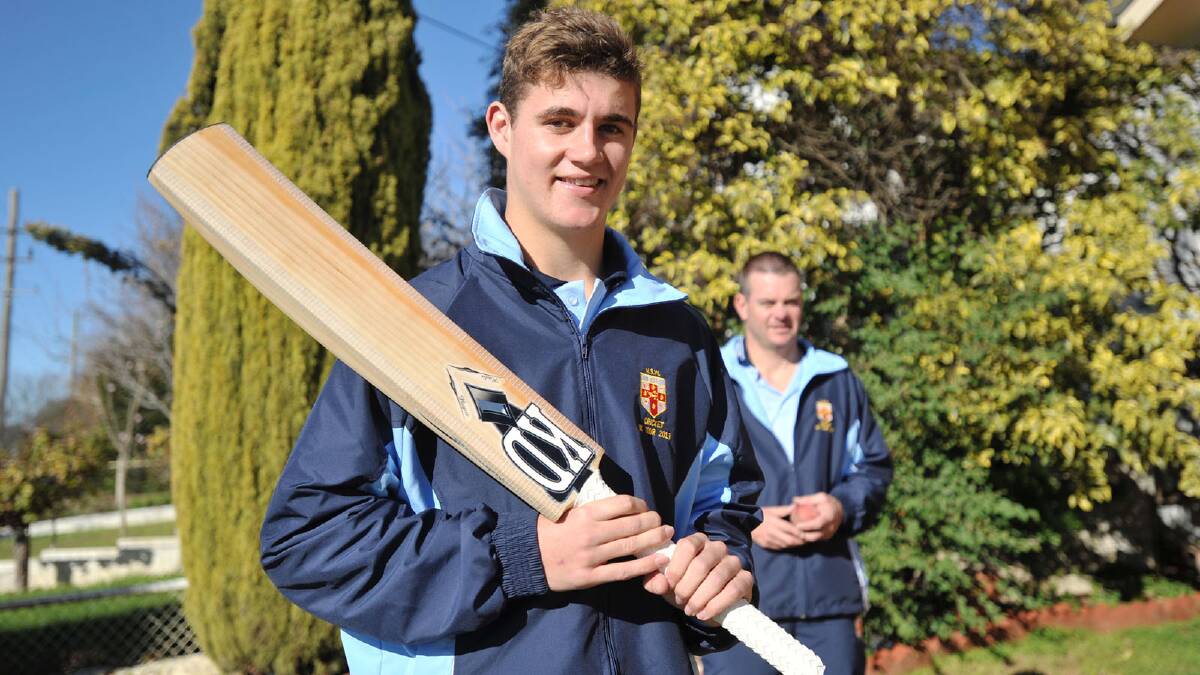 Mick Mattingly, 16, from Wagga High heading to England next week for a cricket tour. He is pictured with teacher Terry Willis. Picture: Alastair Brook