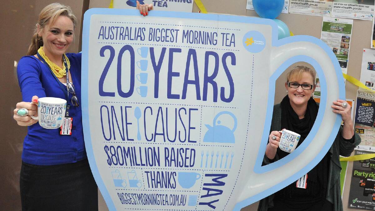 Racheal Cox and Tracy Dawson have some fun at Wagga City Council's Biggest Morning Tea. Picture: Michael Frogley