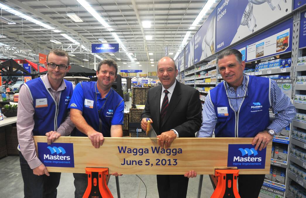 IT’S OFFICIAL: (From left) National Operations Manager of Masters Home Improvement, Grant Brodie, Wagga Store Manager Chris Flanigan, member for Wagga Daryl Maguire and CEO Masters Home Improvement Don Stallings officially open Masters yesterday. Picture: Addison Hamilton