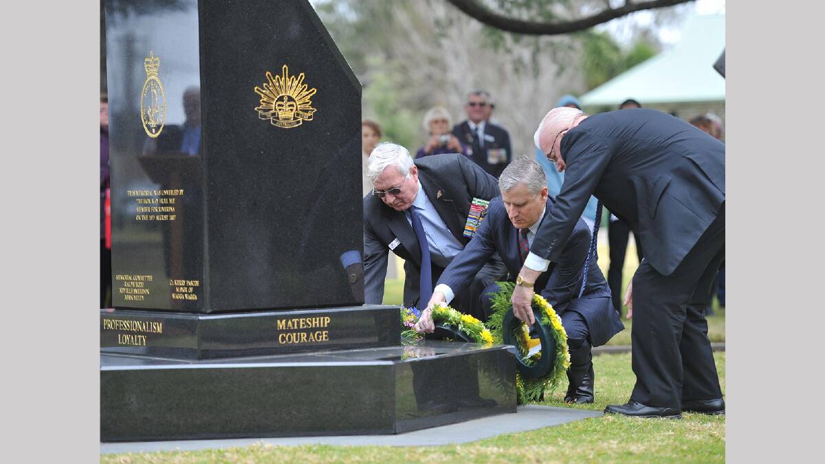 Neville Smerdon President Vietnam Veterans Peacekeepers and Paecemakers Association Riverina sub branch, Member for Riverina Michael McCormack and Mayor of Wagga Kerry Pascoe lay a wreath.